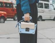 Essentials Every Woman Should Have in Her Purse