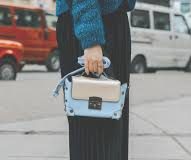 Essentials Every Woman Should Have in Her Purse